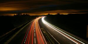 UK highway at night constructed by milestone