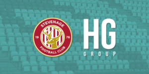 Stevenage and HG Group logo on green background